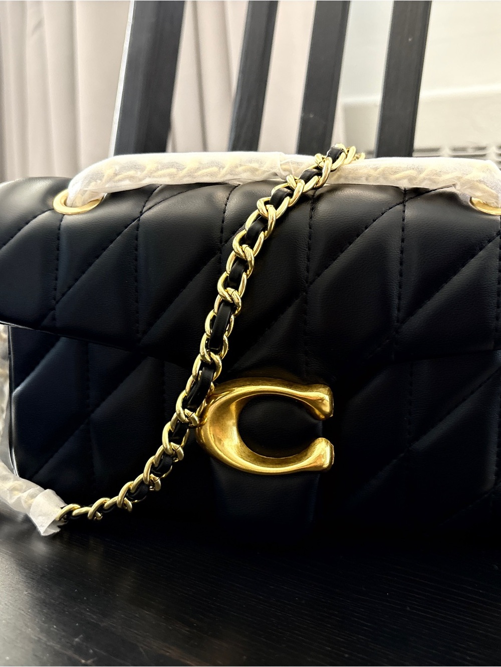Black Quilted Shoulder Bag with Gold Chain and C Logo Hardware